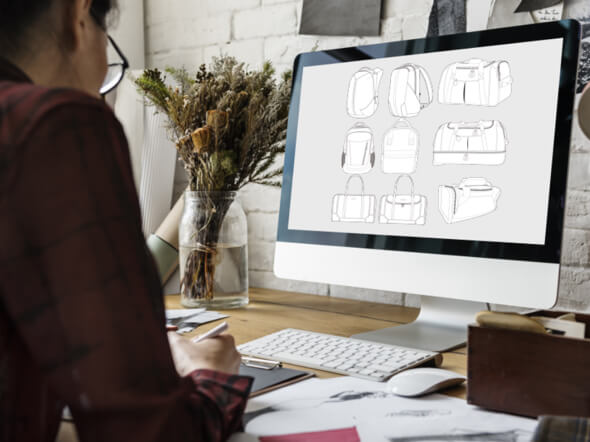 Designer creating custom bag designs